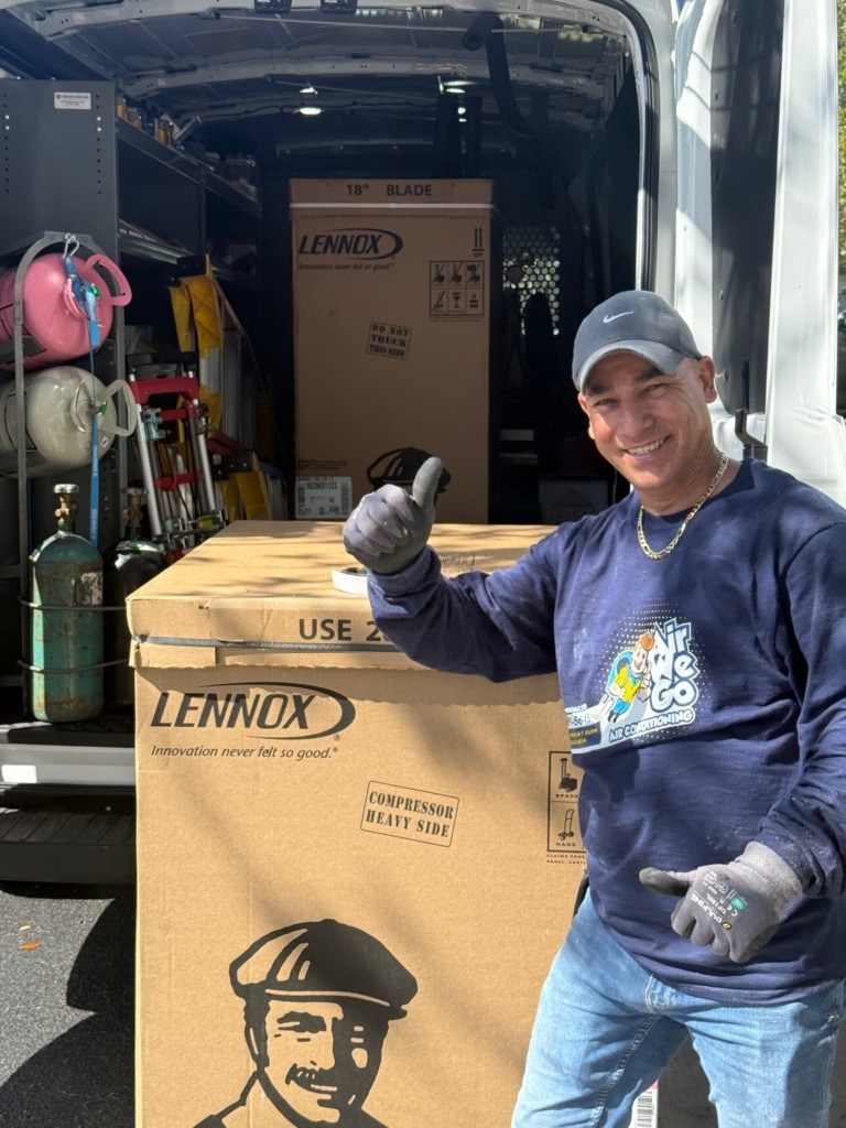 AC replacement Boca Raton FL technician installing new residential AC system