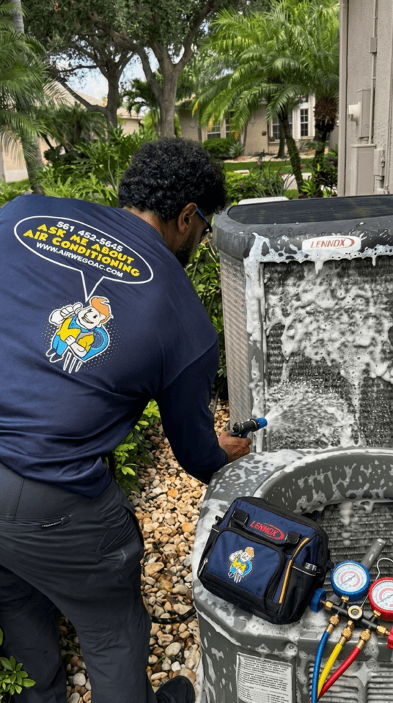 AC maintenance Boca Raton FL technician servicing residential AC system